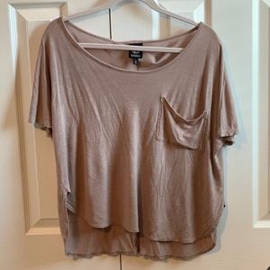 Cute tan/brown top with a front pocket